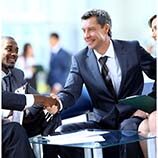 Business people shaking hands at business meeting
